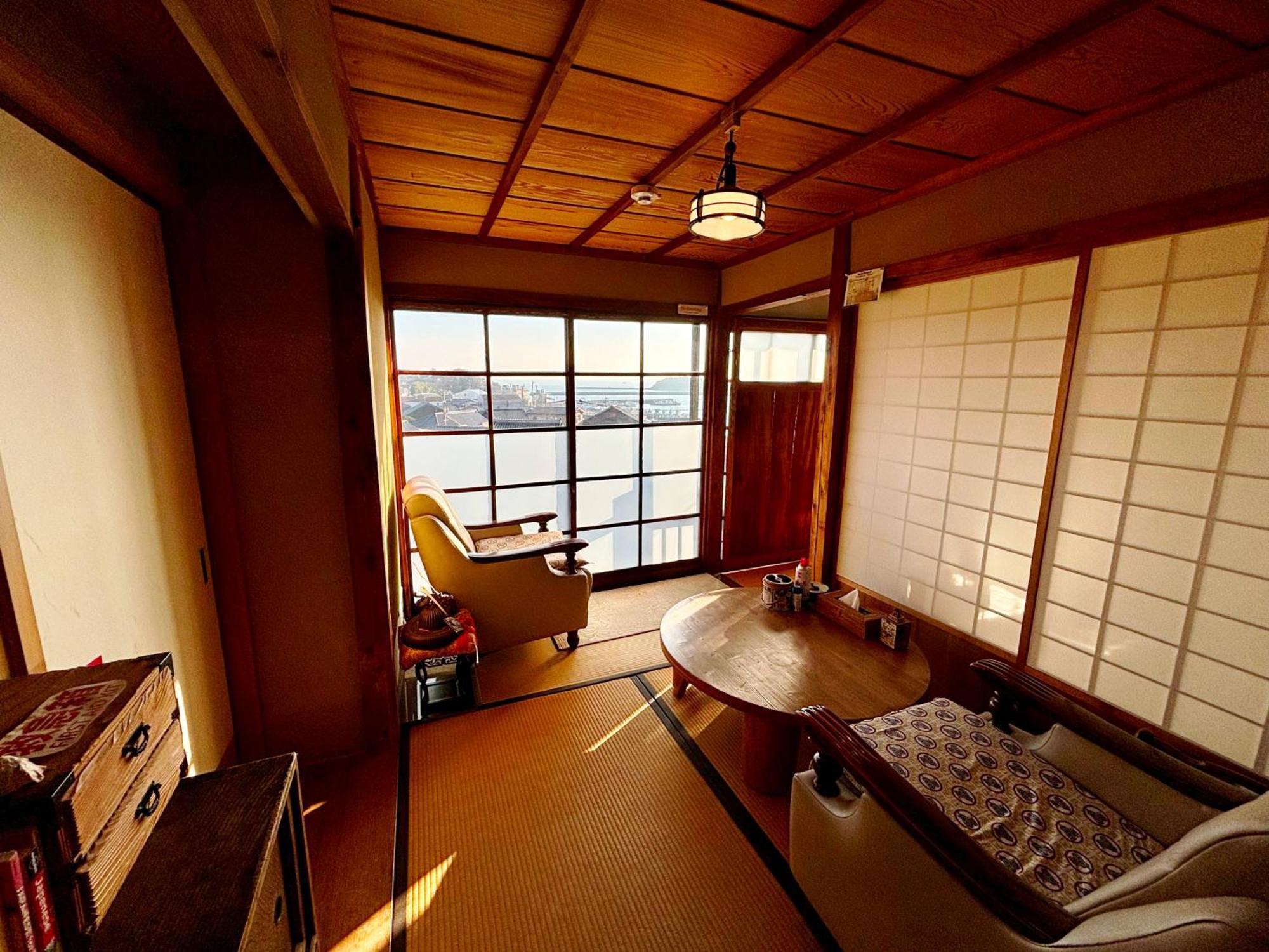 城跡石垣上の絶景古民家宿 鞆城茶屋庵 Tomo Bagian luar foto