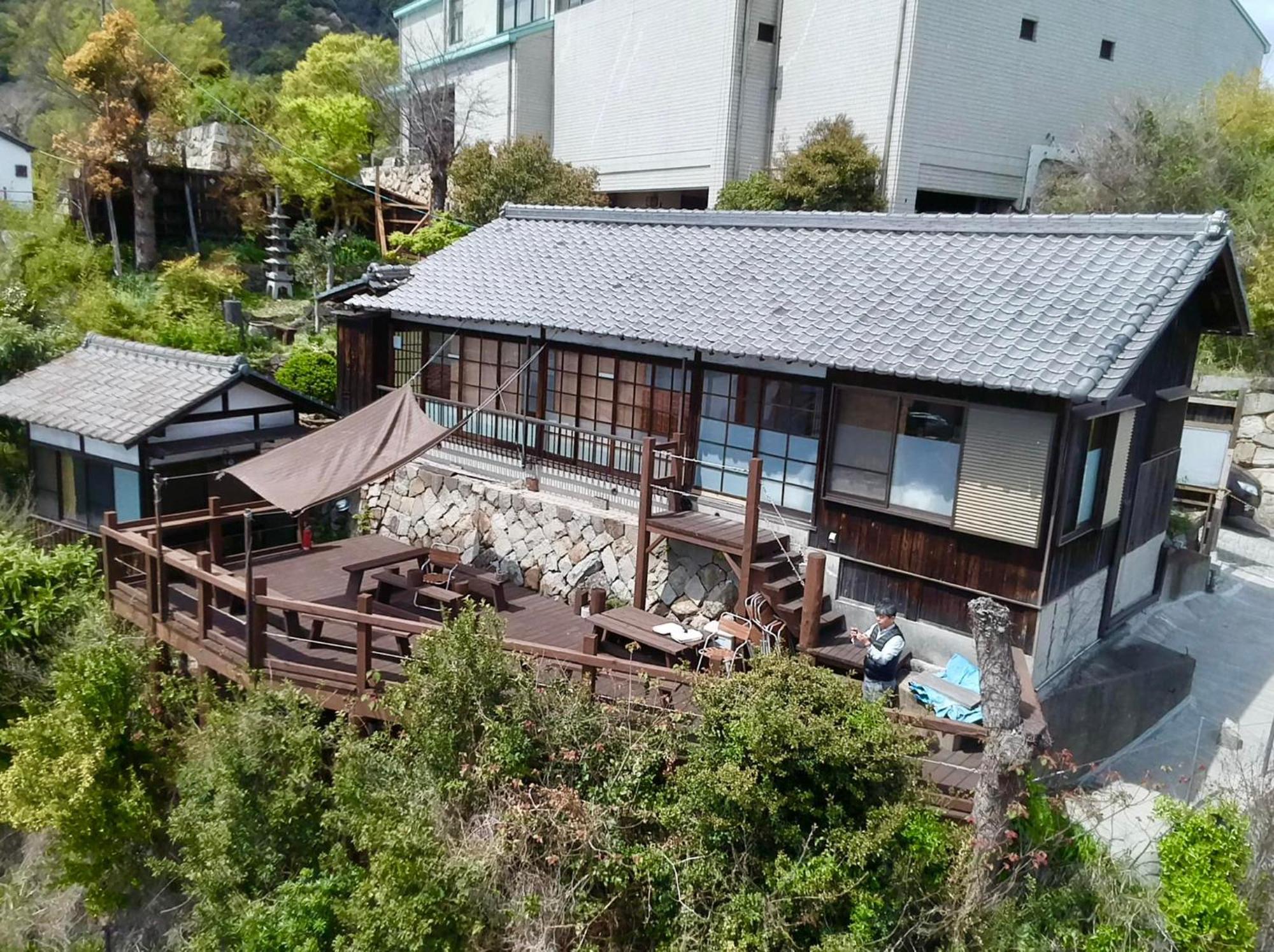 城跡石垣上の絶景古民家宿 鞆城茶屋庵 Tomo Bagian luar foto
